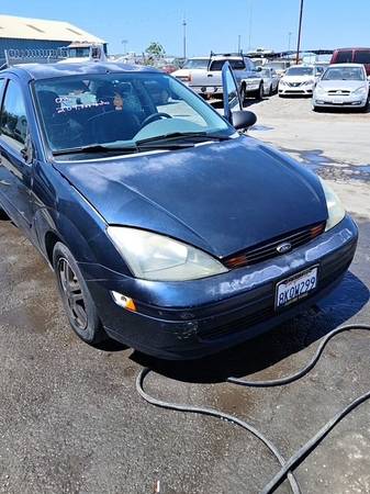 Focus Ford 2003 (Gris) - $1,40063613875196545120