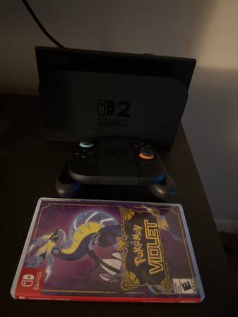 Nintendo Switch 2 New with box and game 1