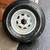 235/80r16.  LoadStar Karrier Brand New 10 ply trailer tire & wheel 2 thumbnail