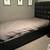 Black leather  tufted hi-backboard  twin bed 1 thumbnail