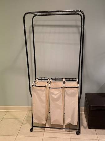 rolling clothing rack with baskets 1