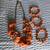 Studios beaded Orange Necklace with Bronze Like chain and flowery deco 1 thumbnail