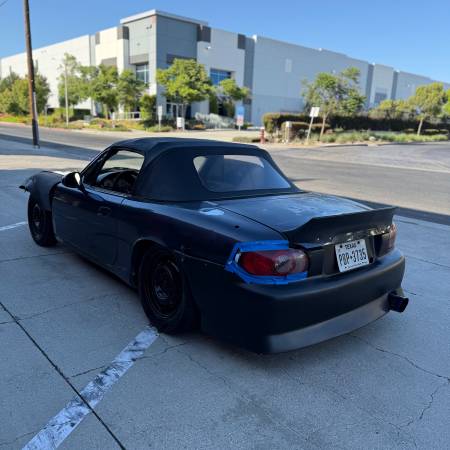 2002 Mazda Miata with a MANUAL TRANSMISSION! - $3,200 (90248)63615926372483124