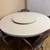 White circular table with metal base with 4 chairs 2 thumbnail