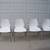 4 stacking IKEA white plastic chairs 1 thumbnail