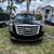 Luxurious SUV with a brown interior and black exterior. 1 thumbnail