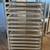 Full sized baker's racks on wheels w/trays 1 thumbnail