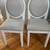2 White padded chairs 1 thumbnail