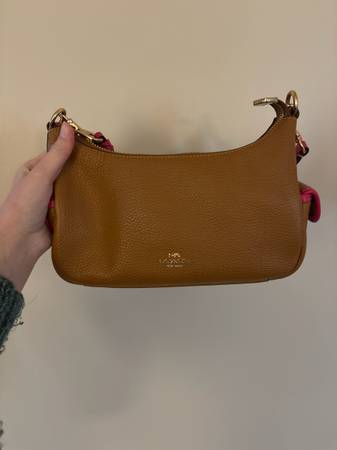 Penny and pink colored Coach Bag 1