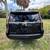 Luxurious SUV with a brown interior and black exterior. 2 thumbnail