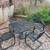 Patio table, 4 chairs, umbrella stand 1 thumbnail