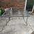 Patio Table With Umbrella Hole, Glass Top in Good Condition 1 thumbnail