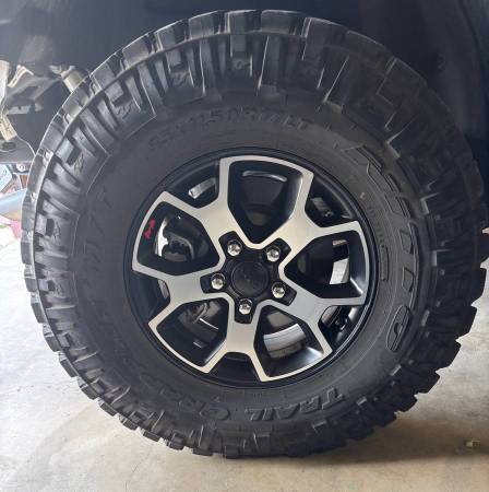 5-35” NITTO TRAIL GRAPPLER TIRES AND JL WHEELS 1