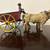 Antique cast iron ox wagon with driver 2 thumbnail