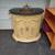 small brass sink mounted in a half moon vanity with black stone top 19 thumbnail