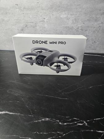 Drone Mini Pro gray quadcopter drone with camera and remote control 1
