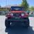 Adventure-Ready 1997 Jeep Wrangler Sport in Vibrant Red 7 thumbnail