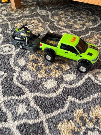 Truck with snowmobile on trailer 1