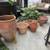 Assorted Terra Cotta Pots with patina 1 thumbnail