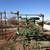 JOHN DEERE 1010 22' MOUNTED FIELD CULTIVATOR(USED #13702) 8 thumbnail