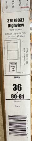 New 36x80 Larson white storm door, pet door 1