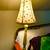 TALL CANDLESTICK LAMP WITH NICE COLORS AND FLOWERS 1 thumbnail