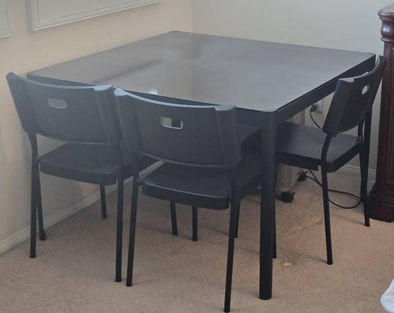 Stylish black tempered Glass table with 3 chairs 1