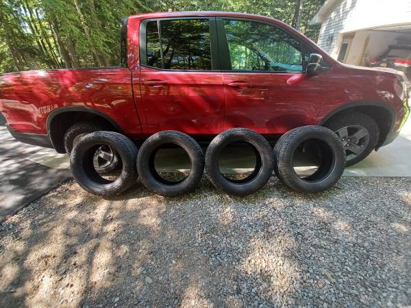 4 Firestone tires LE2 1