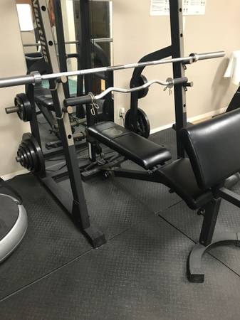 Nautilus workout bench and complete weight set 1