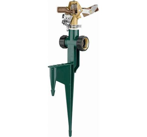 USED ONE-TIME NELSON METAL IMPACT SPRINKLER ON LARGE METAL STEP SPIKE 1