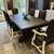 Large black dining room table and set of 8 chairs 1 thumbnail