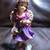 Brown haired angel statute in a purple dress 1 thumbnail