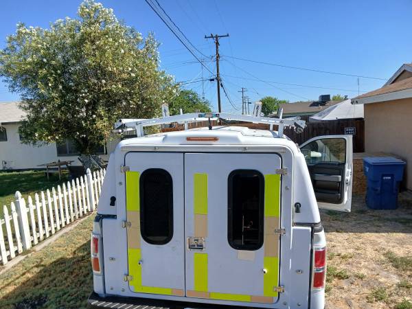 Pick up truck utility shell with shelves and ladder rack 1