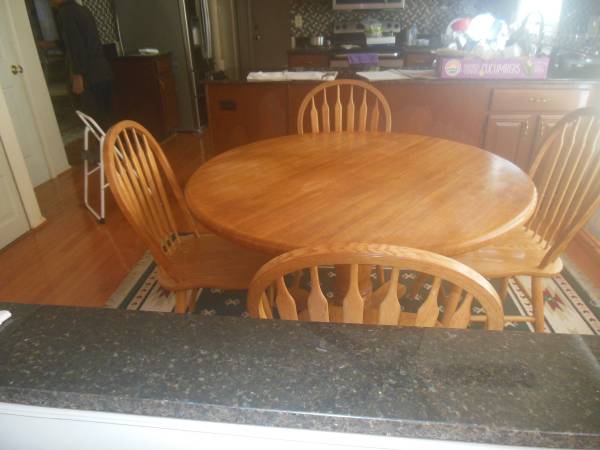 Solid wood dining table with 4 matching chairs 1