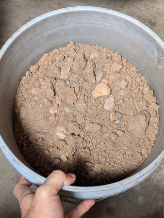 Bucket of sand and rocks 1