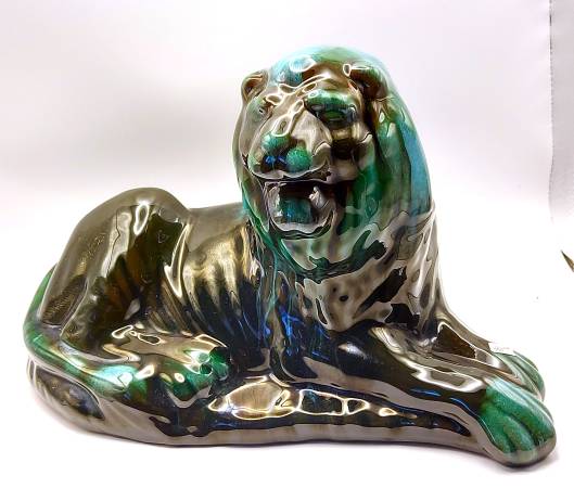 Canadian Blue Mountain sitting lion 1