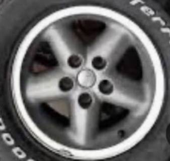 Jeep Wrangler “ Grizzly “ OEM wheels rims tires 1