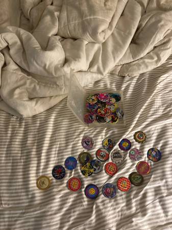 Collection of pogs and Slammer Wammers 1