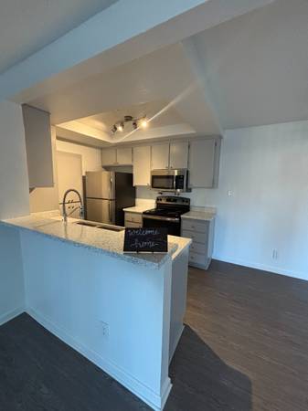 Full Size Washer & Dryer included in our 2 Bedroom Condos!! 1