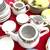 Huge collection of antique saucers, tea, cups, and other kinds of servingware 10 thumbnail