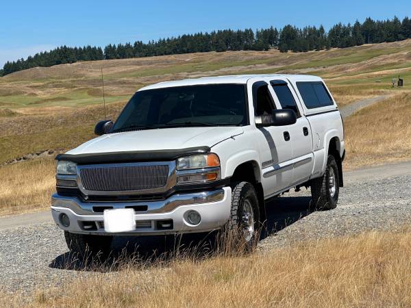 2005 Gmc sierra 2500hd crew cab 4x4 100k millas - $9,950 (Lakewood)63617898567555121