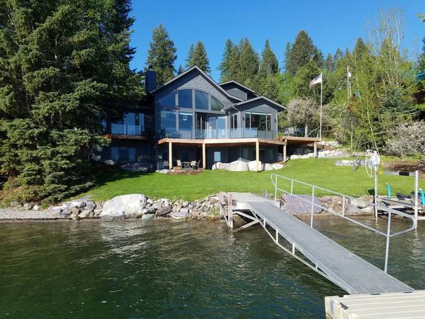 Lakefront Property on Whitefish Lake.. walk out across the lawn 1