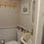 Excellent condition and a beautiful patio with peeks of the water 9 thumbnail