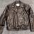 Motorcycle jackets.  Some are Black leather, others fabric. 1 thumbnail