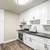 Quartz Counter Tops, Lush resort style landscaping, Custom Cabinets 7 thumbnail