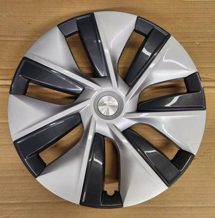 TESLA WHEEL COVERS.  (4 AVAILABLE) 1