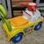 Fisher-Price Little People MusicParade Ride-On with Lights,Sounds, Storage and 8 thumbnail