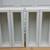 Group of two white upper cabinets 1 thumbnail