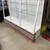 Large wood and glass vendor display shelf. 1 thumbnail