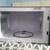 Microwave- Farberware (0.9 cubic ft) 3 thumbnail